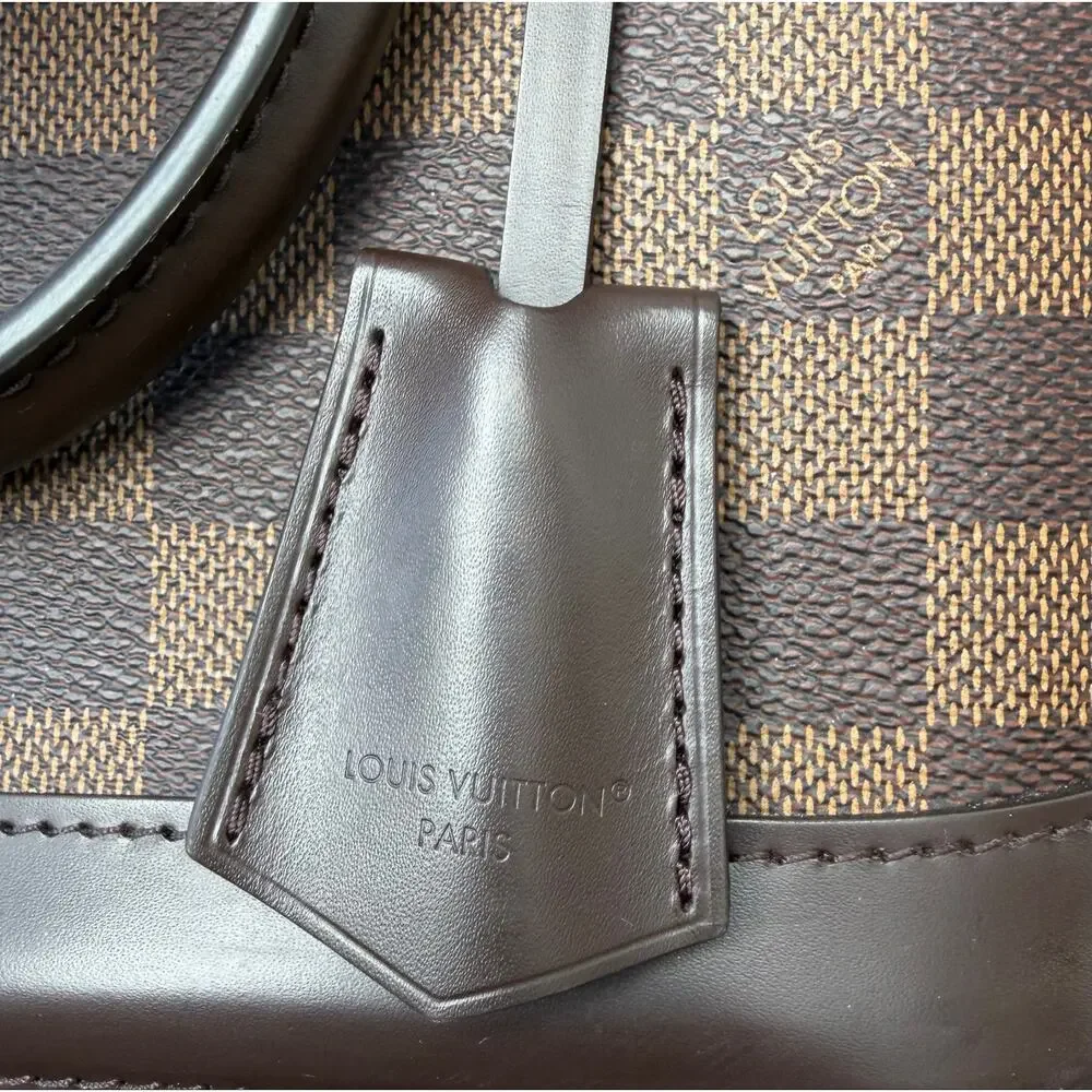 Louis Vuitton Damier Ebene Alma Handbag